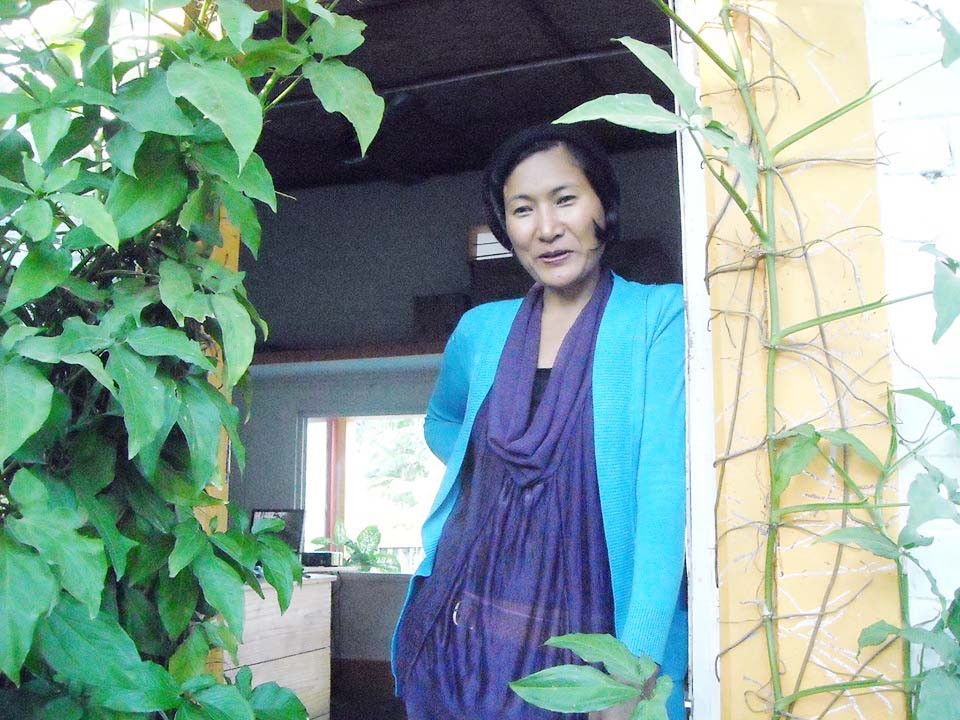 Sonnie Kath, founding member of Exotic Echo Society (EES) at the EES office.